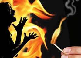 Two get life term for setting woman on fire