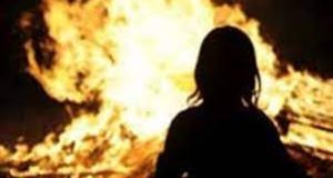 A young girl set on fire